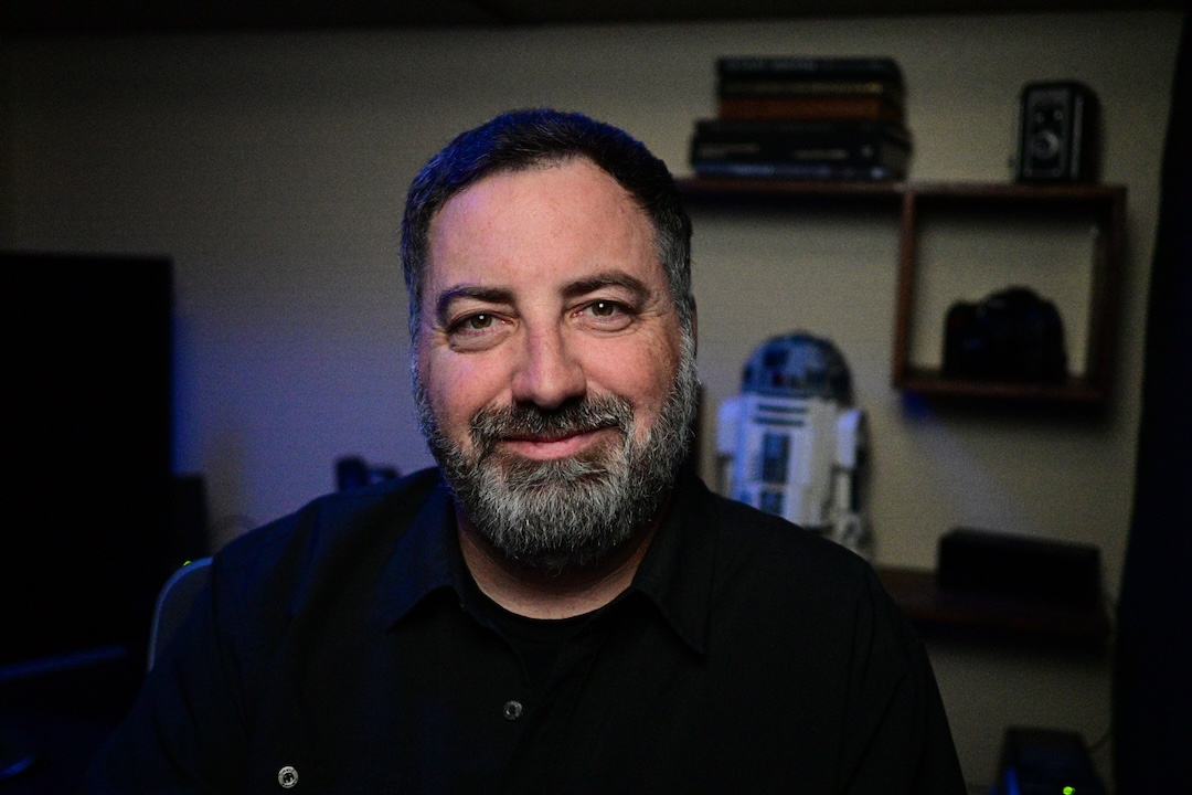 Photo of Michael from IT Multiply in a professional studio setting